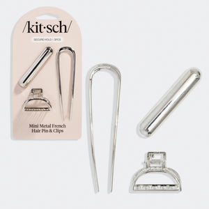 Set of mini metal French hair pin and clips with packaging labeled 'kitsch' on a gray background.