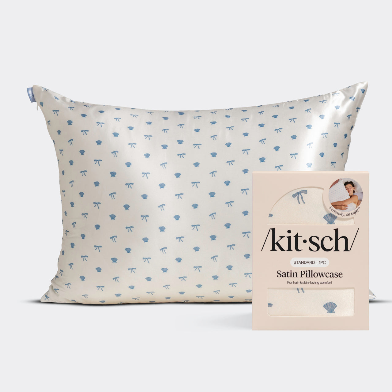 KITSCH Satin Pillowcase in Pearlized Cream & Coastal Blue Print — hero product shot with /kit·sch/ packaging — coastal blue seashells & bows print on pearlized cream satin — Standard 1pc — For hair & skin-loving comfort